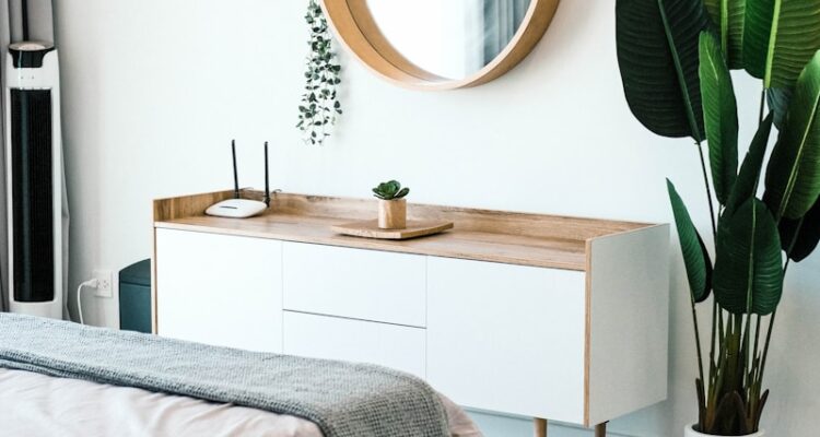 white wooden dresser with mirror